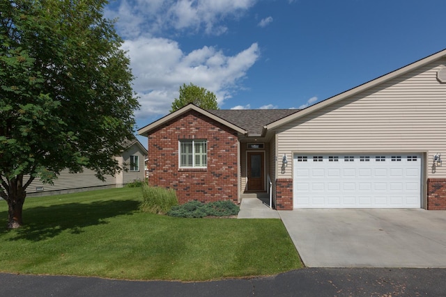 9 Horseshoe Loop Unit B, Hamilton, MT 59840 - single story home featuring brick siding, a front lawn, driveway, and an attached garage