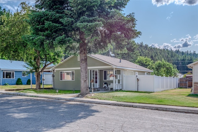 1508 Lolo Ave, Libby, MT 59923 - single story home with a carport