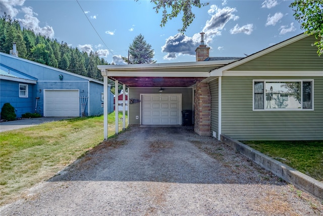 1508 Lolo Ave, Libby, MT 59923 - view of side of home with a chimney, driveway, and a lawn