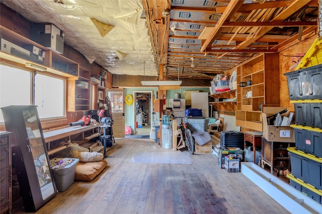1508 Lolo Ave, Libby, MT 59923 - below grade area featuring hardwood / wood-style flooring and a workshop area