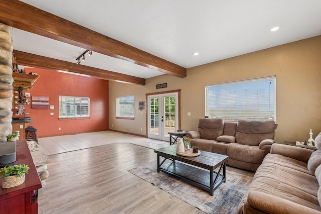 75 N Hill Rd, Kalispell, MT 59901 - living room with beam ceiling, light wood-style floors, recessed lighting, and french doors