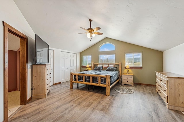 75 N Hill Rd, Kalispell, MT 59901 - bedroom with light wood-type flooring, lofted ceiling, and ceiling fan