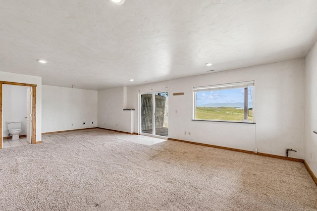 75 N Hill Rd, Kalispell, MT 59901 - unfurnished room featuring carpet flooring and recessed lighting