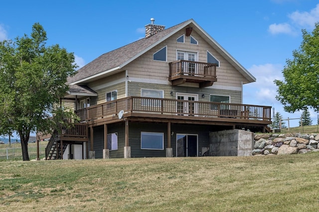 75 N Hill Rd, Kalispell, MT 59901 - back of house with a deck, a balcony, a chimney, and a yard