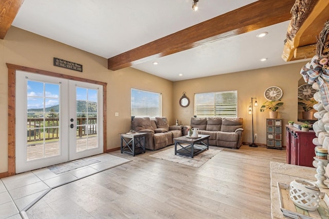 75 N Hill Rd, Kalispell, MT 59901 - living area with french doors, beamed ceiling, wood finished floors, and recessed lighting