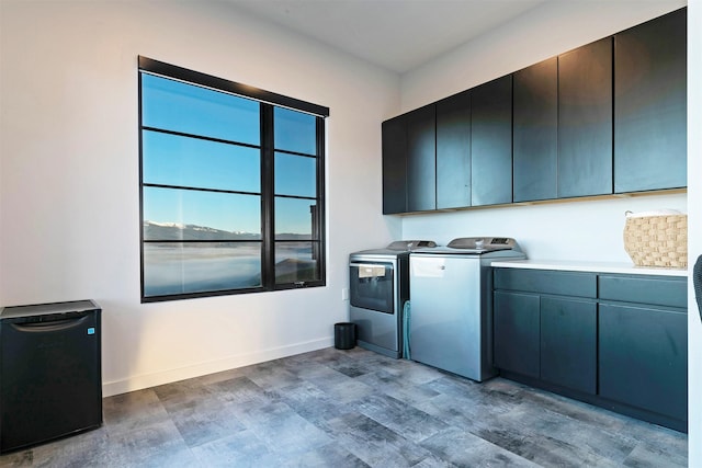 4722 Skalkaho Rd, Philipsburg, MT 59858 - laundry area featuring cabinet space and washing machine and dryer