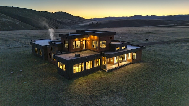 4722 Skalkaho Rd, Philipsburg, MT 59858 - back of property at dusk with a mountain view
