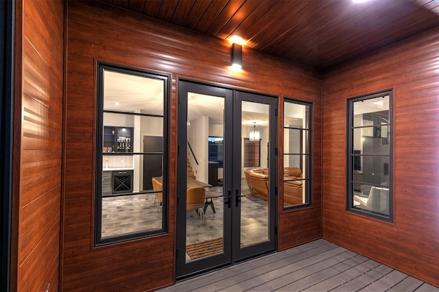 4722 Skalkaho Rd, Philipsburg, MT 59858 - entryway with french doors, wood finished floors, wood walls, and wooden ceiling