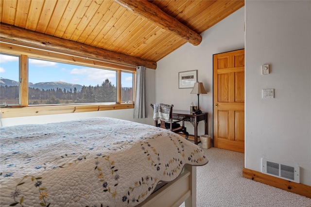 182 Moondance Trl, Bigfork, MT 59911 - carpeted bedroom featuring wooden ceiling and a mountain view