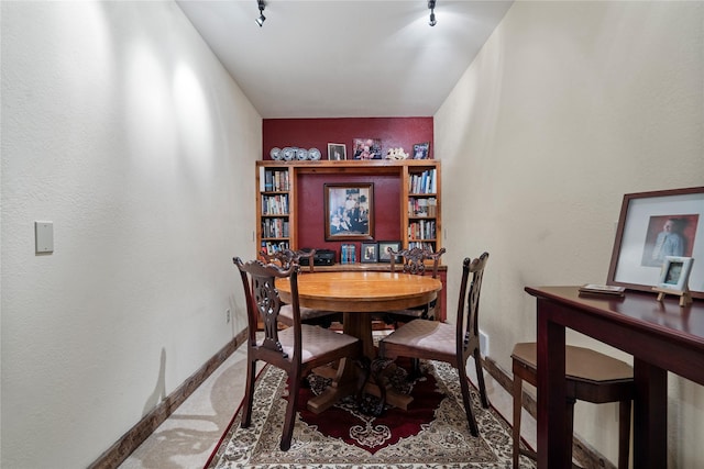 182 Moondance Trl, Bigfork, MT 59911 - dining room featuring baseboards and carpet flooring