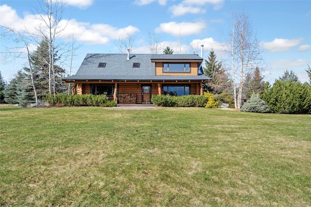 182 Moondance Trl, Bigfork, MT 59911 - back of property featuring a yard and roof with shingles