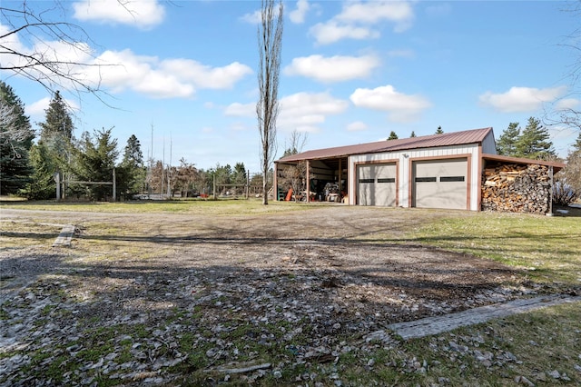 182 Moondance Trl, Bigfork, MT 59911 - garage featuring a garage and driveway
