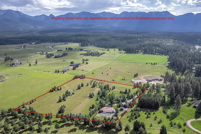 182 Moondance Trl, Bigfork, MT 59911 - overview of rural landscape featuring property boundaries highlighted and mountains