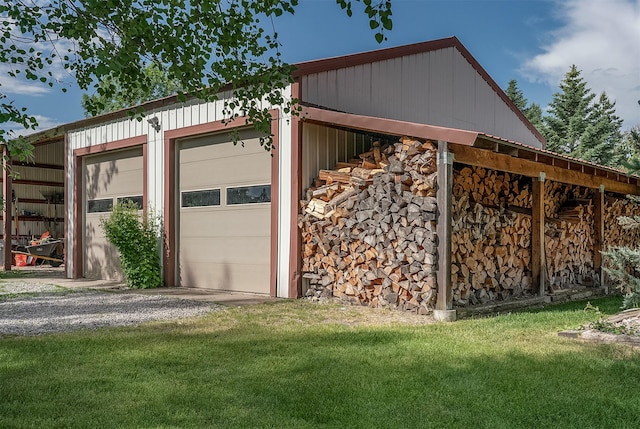 182 Moondance Trl, Bigfork, MT 59911 - garage featuring gravel driveway