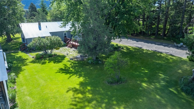 3101 Mt Highway 206, Columbia Falls, MT 59912 - view of green lawn with a wooden deck