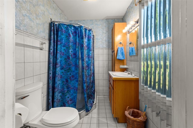 3101 Mt Highway 206, Columbia Falls, MT 59912 - full bathroom featuring tile walls, vanity, tile patterned floors, a stall shower, and wallpapered walls