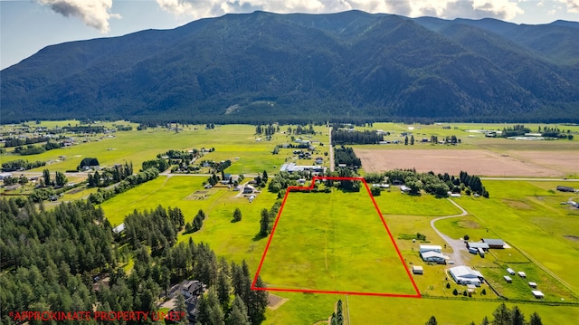 3101 Mt Highway 206, Columbia Falls, MT 59912 - aerial view of sparsely populated area featuring property boundaries highlighted and mountains