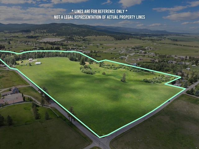 1695 Whalebone Dr, Kalispell, MT 59901 - view of rural area featuring property parcel outlined and mountains