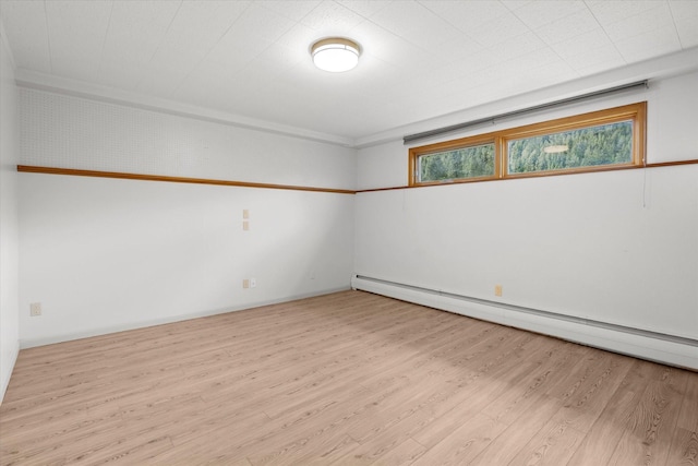 1695 Whalebone Dr, Kalispell, MT 59901 - empty room featuring baseboard heating and wood finished floors