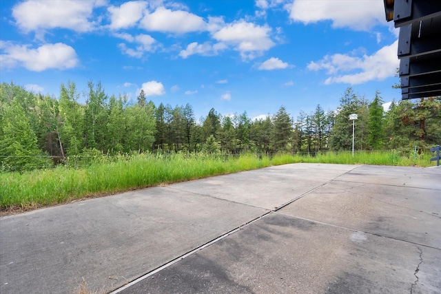 1695 Whalebone Dr, Kalispell, MT 59901 - view of patio with a view of trees