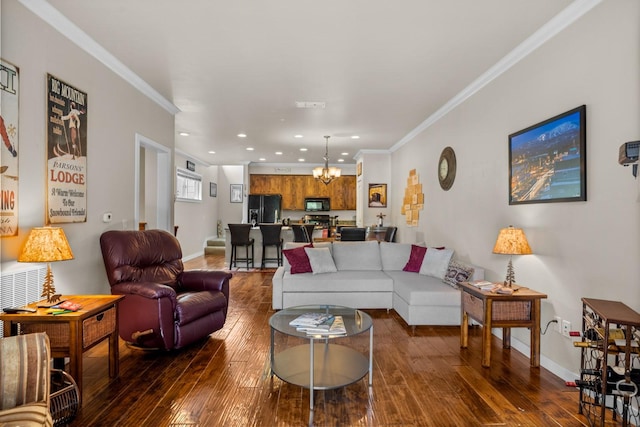 6203 Monterra Ave Unit H, Whitefish, MT 59937 - living area with dark wood-style floors, recessed lighting, a chandelier, and crown molding