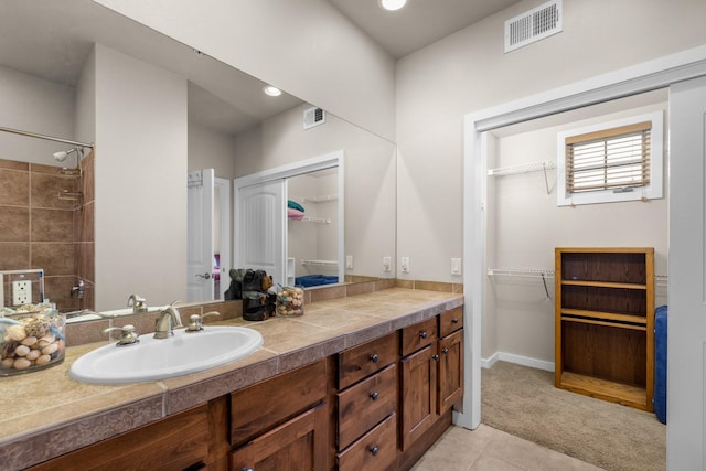 6203 Monterra Ave Unit H, Whitefish, MT 59937 - bathroom featuring vanity, a walk in closet, a shower, and recessed lighting
