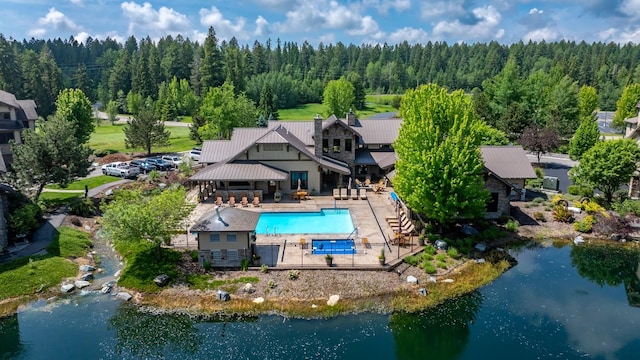 6203 Monterra Ave Unit H, Whitefish, MT 59937 - view from above of property featuring a heavily wooded area and a pool area