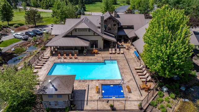 6203 Monterra Ave Unit H, Whitefish, MT 59937 - community pool featuring a patio and stairs
