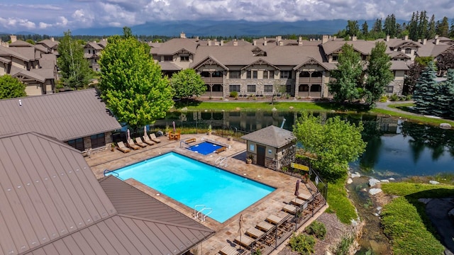 6203 Monterra Ave Unit H, Whitefish, MT 59937 - community pool with a residential view, a patio area, and a water view