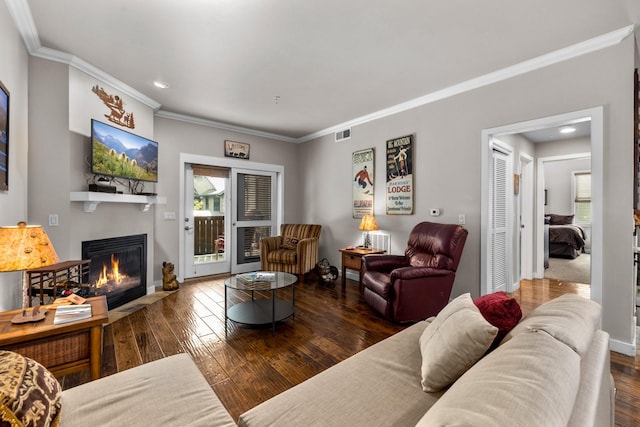 6203 Monterra Ave Unit H, Whitefish, MT 59937 - living area with a fireplace with flush hearth, ornamental molding, hardwood / wood-style flooring, and recessed lighting