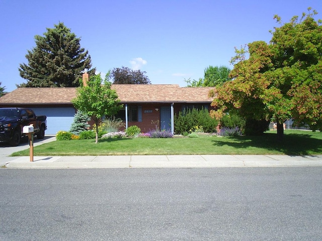 2424 Teakwood Ln, Helena, MT 59601 - single story home featuring an attached garage and a front yard