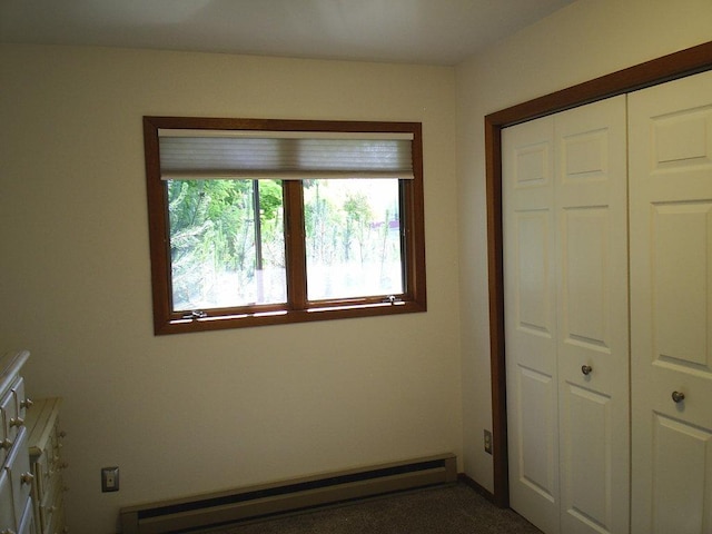 2424 Teakwood Ln, Helena, MT 59601 - unfurnished bedroom with baseboard heating and a closet