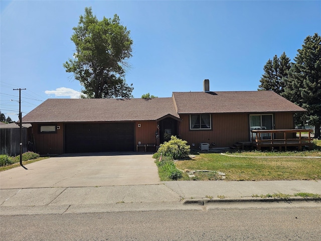 2026 8th Ave S, Great Falls, MT 59405 - ranch-style house featuring a front lawn, a garage, driveway, a chimney, and roof with shingles