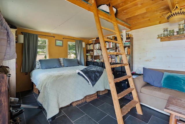 NHN Doe Run Trail, Polson, MT 59860 - bedroom featuring wooden walls and tile patterned floors