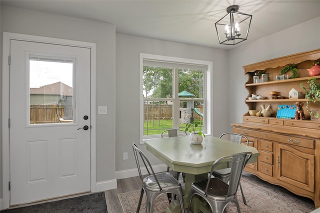 3806 Timothy Ln, Helena, MT 59602 - dining area featuring a chandelier and dark wood-style floors