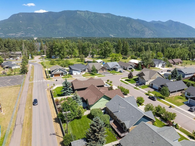 521 Evening Star Ln, Columbia Falls, MT 59912 - aerial perspective of suburban area featuring a mountainous background