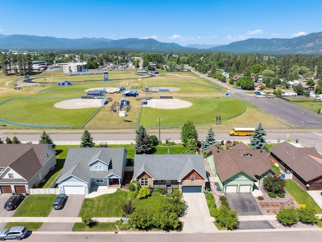 521 Evening Star Ln, Columbia Falls, MT 59912 - aerial perspective of suburban area featuring mountains