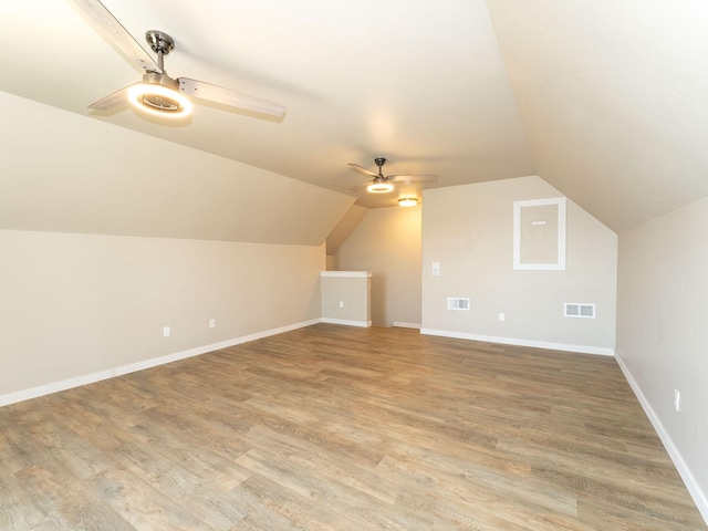 521 Evening Star Ln, Columbia Falls, MT 59912 - bonus room with a ceiling fan, vaulted ceiling, and light wood finished floors