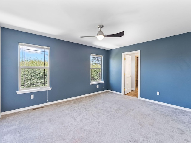 521 Evening Star Ln, Columbia Falls, MT 59912 - empty room with ceiling fan and carpet flooring