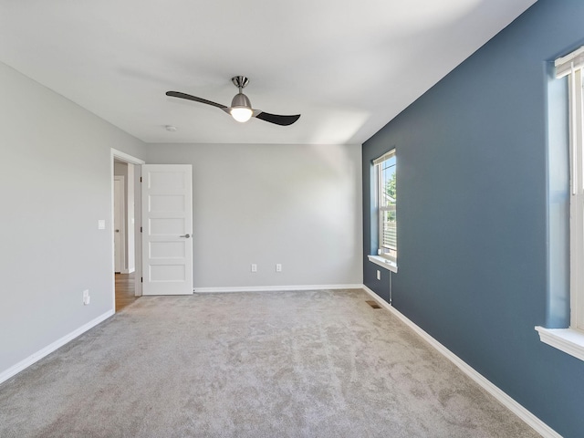 521 Evening Star Ln, Columbia Falls, MT 59912 - empty room featuring a ceiling fan and carpet floors