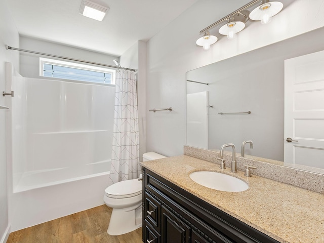 521 Evening Star Ln, Columbia Falls, MT 59912 - full bathroom with vanity, wood finished floors, and shower / tub combo