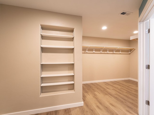 521 Evening Star Ln, Columbia Falls, MT 59912 - walk in closet featuring wood finished floors