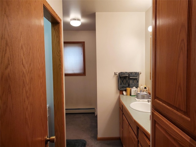 650 Hollibaugh Rd, Stevensville, MT 59870 - bathroom with a baseboard heating unit and vanity
