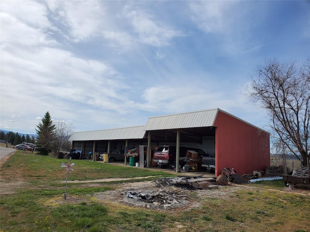 650 Hollibaugh Rd, Stevensville, MT 59870 - view of pole building featuring a carport