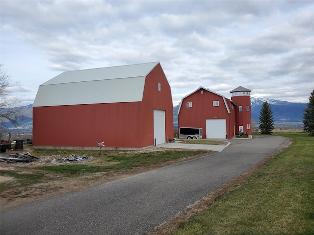 650 Hollibaugh Rd, Stevensville, MT 59870 - view of barn with asphalt driveway and a mountain view