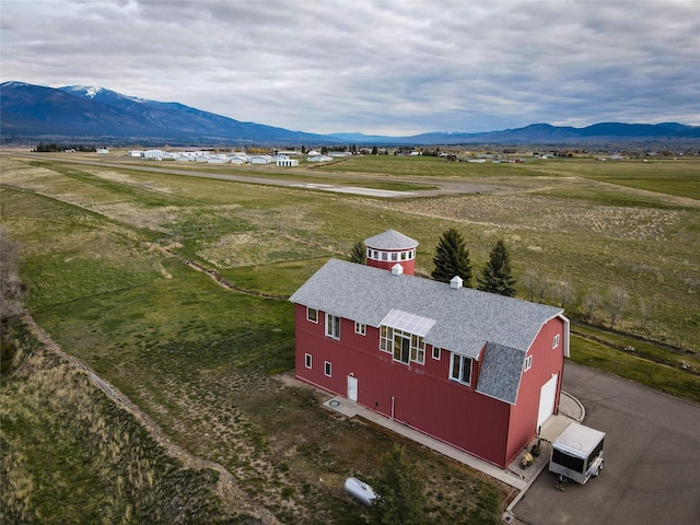 650 Hollibaugh Rd, Stevensville, MT 59870 - overview of rural landscape with a mountain backdrop