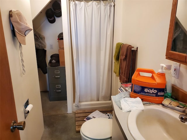 650 Hollibaugh Rd, Stevensville, MT 59870 - bathroom with concrete flooring, vanity, and a shower with shower curtain