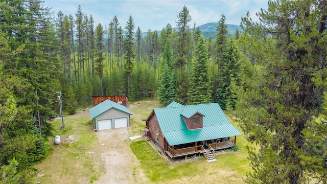 6343 Packer Creek Rd, Haugan, MT 59842 - view of subject property with a forest and a mountain backdrop