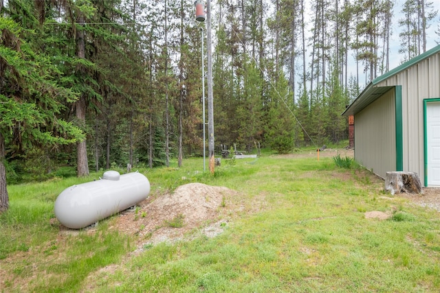 6343 Packer Creek Rd, Haugan, MT 59842 - view of grassy yard with a forest view