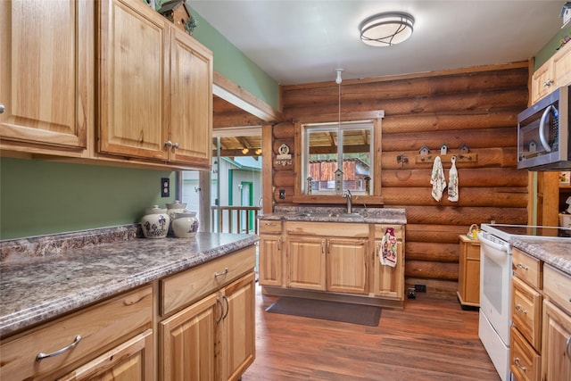6343 Packer Creek Rd, Haugan, MT 59842 - kitchen with white electric range, stainless steel microwave, log walls, dark wood-type flooring, and stone countertops